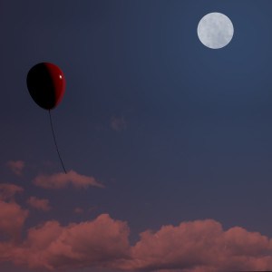Red Balloon Soaring At Nighttime Representing Freedom Or Being Alone